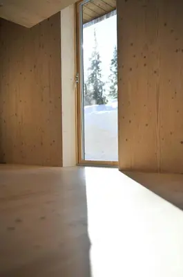 an empty room with a door and a window at Modern Family Cabin With Trysil Mountain Views in Trysil