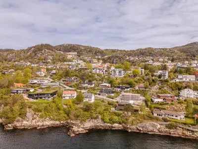 an aerial view of a town next to the water at Panoramic view with private terrace in Bergen