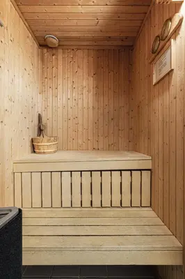a sauna with a bench in a wooden room at Spacious Family Apartment in Hemsedal, Ski In-Out, Sauna, 30m from Skarsnuten hotell in Hemsedal