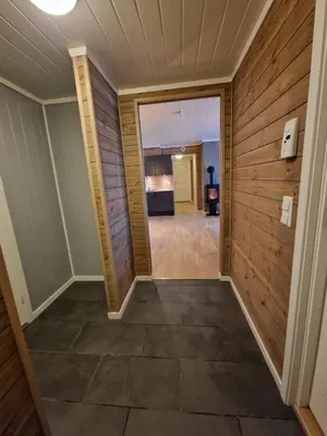 a hallway of a home with wood paneling at Apartment in Voss - Tråstølen in Skulestadmo