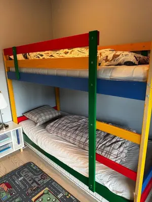 two bunk beds sitting next to each other in a room at Familyhome for 8 people - 4 bedrooms - 10min from Bergen city center in Bergen