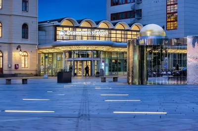 a large building with benches in front of it at Beautiful apartment in the city center in Lii