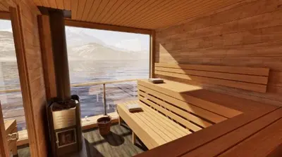 a sauna with a bench and a view of the ocean at Beautiful apartment in the city center in Lii
