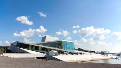 a large glass building with a sky at Beautiful apartment in the city center in Lii