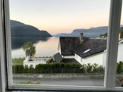 a window with a view of a body of water at The View in Sauda