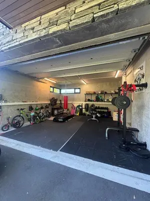 a parking garage with bikes parked in it at Villa Vaaganeset in Lii