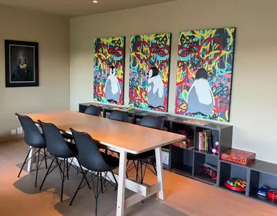 a conference room with a wooden table and chairs at Colorful family apartment near the sea - boat for rent