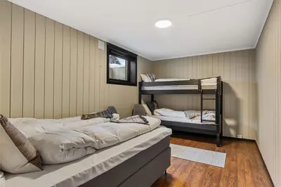 a room with two bunk beds in a room at Trysilfjell 33 by Vacation Trysil in Trysil