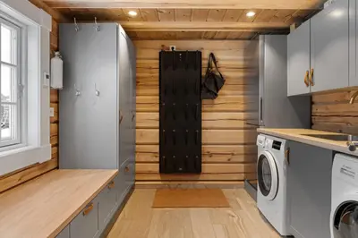 a laundry room with a washer and dryer at Trysilfjell 25 by Vacation Trysil in Trysil