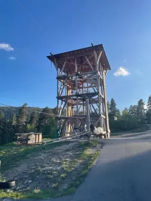 a wooden structure on the side of a road at Moderne og romslig familiehytte i Stryn in Stryn