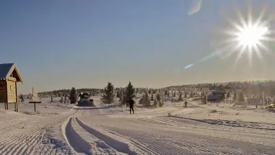 a person is skiing down a snow covered road at Cabin with ski in-out in Sør-Fron