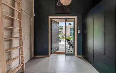 a hallway with a door leading to a patio at Lovely Home In Ål With House Sea View in Ål