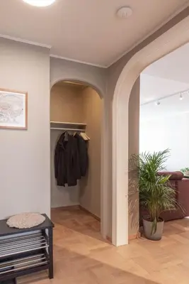a walk in closet with a potted plant at Nice apartment with stunning view over Bryggen in Bergen
