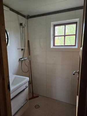 a bathroom with a sink and a window at Utsikten in Geilo