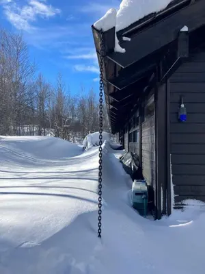 a house with snow on the side of it at Ski in ski out in Geilo, comfortable and family friendly cabin in Geilo