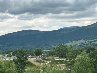 a view of a valley with mountains in the background at Solsiden Geilo Cozy Studio location Geilo Centrum in Hol