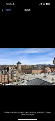 two pictures of a city with a view at Munkegata 30 Trondheim in Trondheim