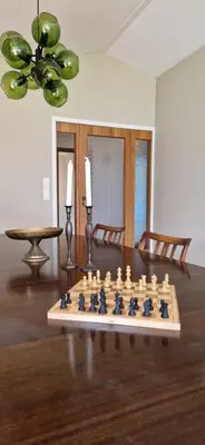 a chess board on a table in a room at Hus ved sjøen, med strand og naust in Sauda