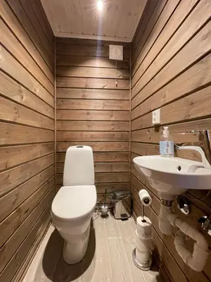 a bathroom with a toilet and a sink at Annebu by Norgesbooking - cabin at 1000 meter with amazing view in Ål