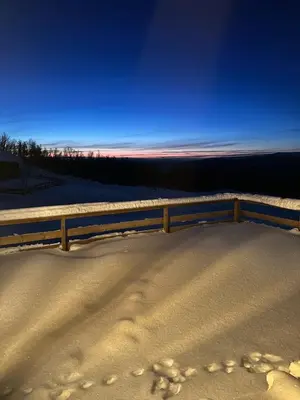 a fence on top of a snow covered field at Annebu by Norgesbooking - cabin at 1000 meter with amazing view in Ål