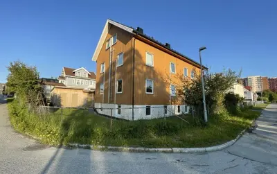 a house sitting on the side of a street at Alfred Apartment in Trondheim in Trondheim