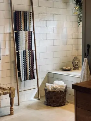 a bathroom with a towel rack and a basket at No71 Golsfjellet in Golsfjellet
