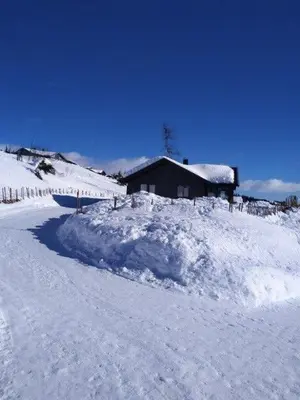 a pile of snow in front of a house at Cabin With Views Over Hafjell And Gausdal in Svingvoll