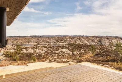 a view from the deck of a house at Architect-Designed Cabin Panoramic View in Ervik