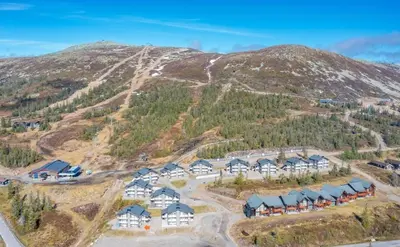 an aerial view of a village on a mountain at Mountain Apartment By Trysil's Best Bike Trails in Trysil