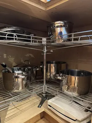 a kitchen with pots and pans on a shelf at Red Cross Cabin, Spacious mountain lodge in Gol