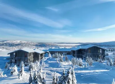 an aerial view of a resort in the snow at Pellestova - Hafjell in Øyer