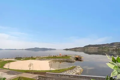 a view of a body of water with a pier at Great and modern apartment at Grilstad Marina! in Trondheim