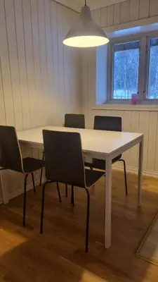 a conference room with a table and chairs at Sentrumsvegen 28, GOL in Gol
