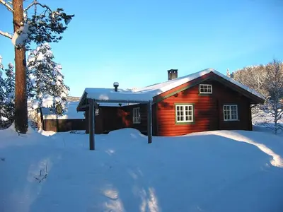 a log cabin with snow on the ground at Tveitehaug cabin, 3-4 bedroom cabin close to ski center in Ål