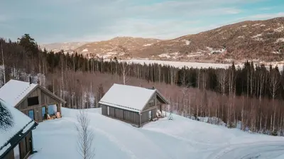an aerial view of two buildings in the snow at Cabin at Norefjell ski resort, nice view in Noresund
