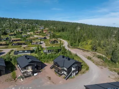 an aerial view of a village with houses and a road at Fagerasen 760B by Vacation Trysil in Trysil
