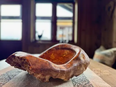 a wooden spoon sitting on top of a table at Modern cabin sauna, BBQ & beautiful view Filefjell in Tyinkrysset