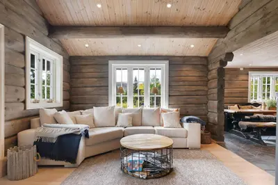 a living room with a couch and a table at Trysilfjell 811 by Vacation Trysil in Trysil