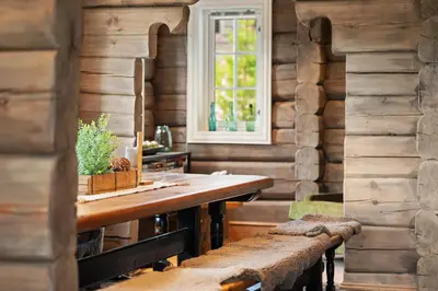 a dining room with a table and a window at Trysilfjell 811 by Vacation Trysil in Trysil