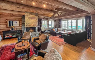 a living room filled with furniture and a fireplace at Nice Home In Lillehammer in Lillehammer