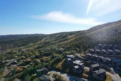 an aerial view of a village in the mountains at Moderne leilighet i Vestlia-Ski in ski out in Geilo