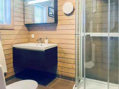 a bathroom with a sink and a shower at Traditional Cabin With Annex In The Mountains in Gol