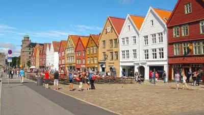 a group of people walking on a city street at Pepes Apartment in Bergen