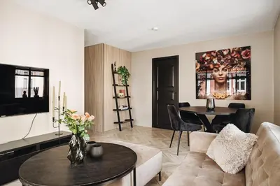 a living room with a couch and a table at Modern & Chic Apartment Luxurious Details in Bergen