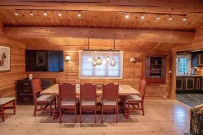 a dining room with a table and chairs at Trysilfjellet Nord 901 in Trysil