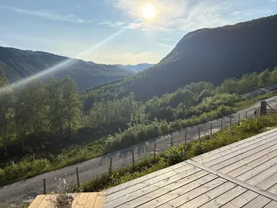 a view of a valley from a roof at Cosy cabin in Hemsedal with ski in-ski out to Solheisen in Hemsedal
