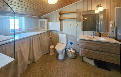 a bathroom with a toilet and a sink and a shower at 3 Bedroom Lovely Home In Dagali in Dagali