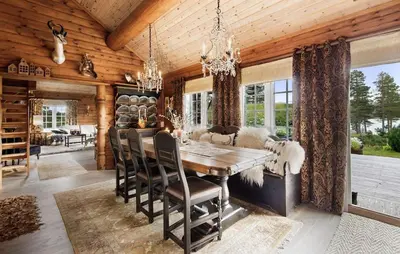 a dining room with a wooden ceiling and a table and chairs at Awesome Home In Flesberg With Sauna in Flesberg