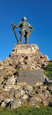 a statue of a soldier on top of a mountain at Koselig ved Fjorden - Vangsnes in Vangsnes