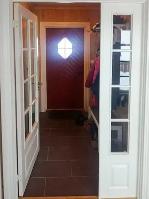 a red door with a window in a room at Mountain Gem With Ski In And Out At Golsfjellet in Gol